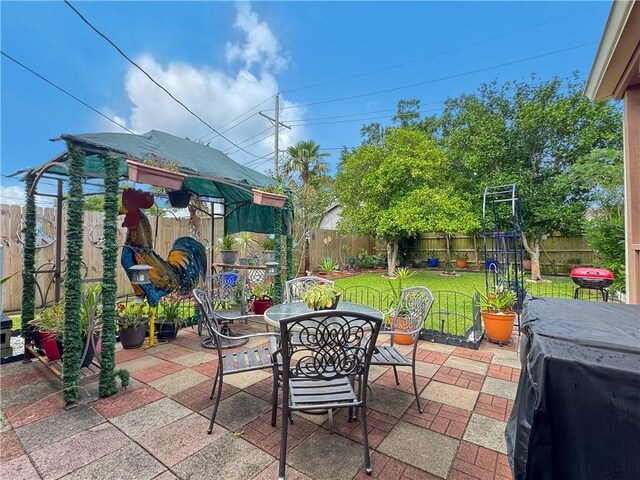 4153 W Loyola Dr, Kenner, LA 70065 - view of patio / terrace featuring outdoor dining area