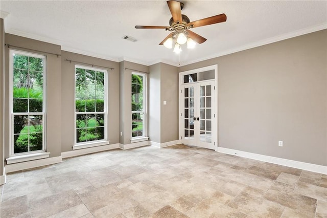 102 Ayshire Ct, Slidell, LA 70461 - empty room with french doors, baseboards, light stone finish flooring, ceiling fan, and crown molding