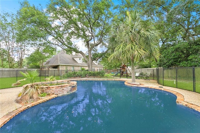 102 Ayshire Ct, Slidell, LA 70461 - view of pool with a playground, a fenced backyard, and a pool with connected hot tub