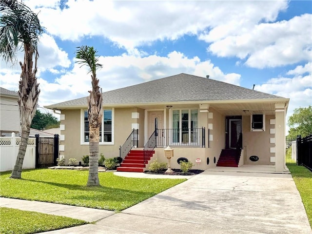 4608 Loveland St, Metairie, LA 70006 - bungalow-style house featuring stucco siding, a gate, and driveway