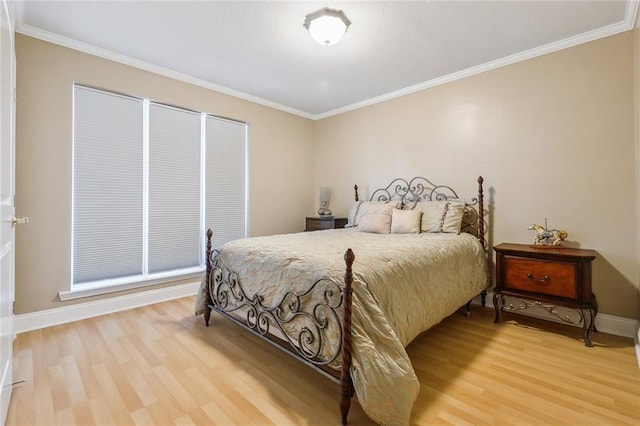 4608 Loveland St, Metairie, LA 70006 - bedroom featuring light wood-type flooring, ornamental molding, and baseboards