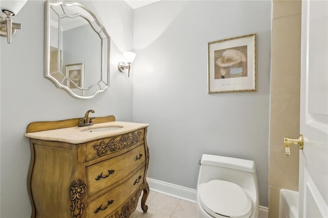 4608 Loveland St, Metairie, LA 70006 - full bathroom with vanity, toilet, a tub to relax in, baseboards, and tile patterned floors
