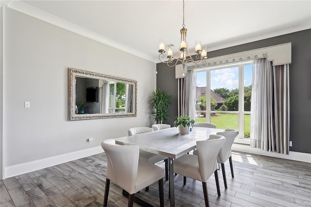 317 E Augusta Ln, Slidell, LA 70458 - dining space featuring a chandelier, plenty of natural light, crown molding, and wood finished floors