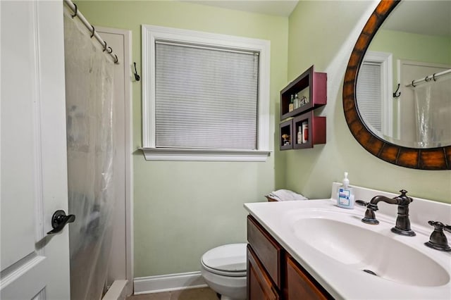 3845 Croydon St, Slidell, LA 70458 - bathroom with vanity, a shower with shower curtain, toilet, and baseboards