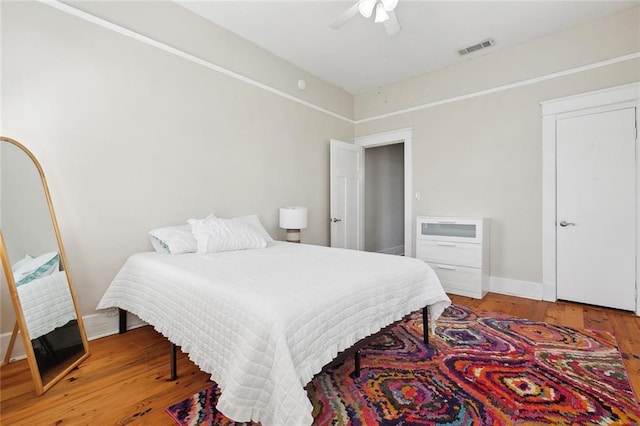2933 Calhoun St Unit 2933, New Orleans, LA 70118 - bedroom featuring light wood-style floors, ceiling fan, and baseboards