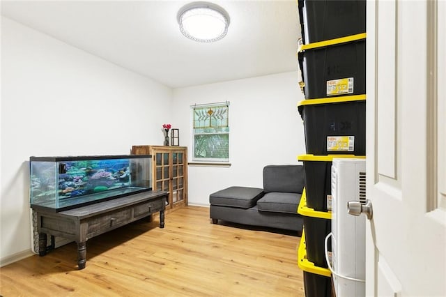 2405 Mariette Dr, Chalmette, LA 70043 - sitting room with wood finished floors