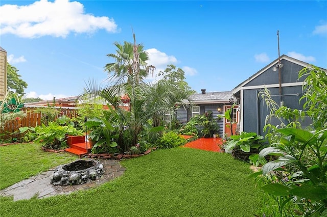 2405 Mariette Dr, Chalmette, LA 70043 - view of yard with a fire pit