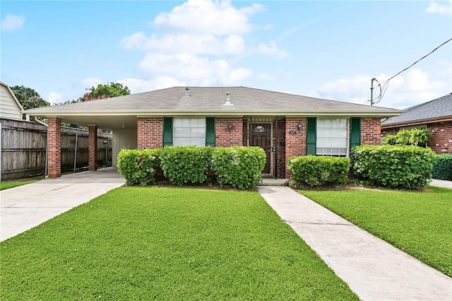 4508 Hastings St, Metairie, LA 70006 - view of front of home with driveway, a carport, and brick siding