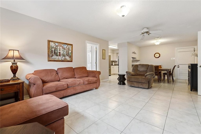 4508 Hastings St, Metairie, LA 70006 - living room with a ceiling fan, light tile patterned floors, and baseboards