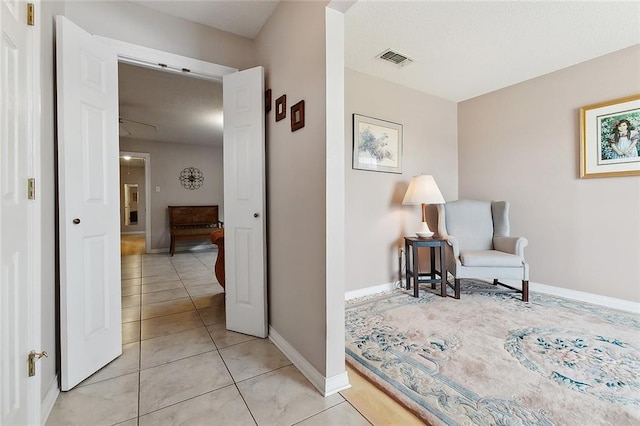 4508 Hastings St, Metairie, LA 70006 - hall featuring light tile patterned flooring and baseboards