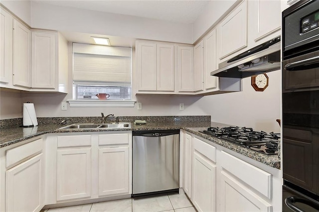 4508 Hastings St, Metairie, LA 70006 - kitchen with black appliances, a sink, under cabinet range hood, white cabinetry, and light tile patterned floors
