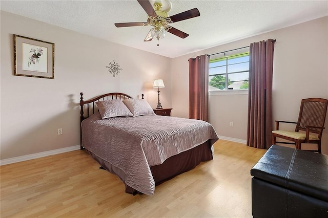 4508 Hastings St, Metairie, LA 70006 - bedroom with light wood-style floors, baseboards, and a ceiling fan