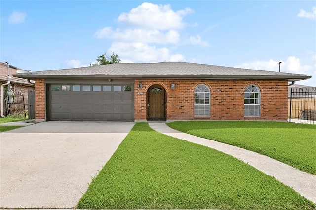 4901 Friar Tuck Dr, New Orleans, LA 70128 - ranch-style house with concrete driveway, an attached garage, and brick siding