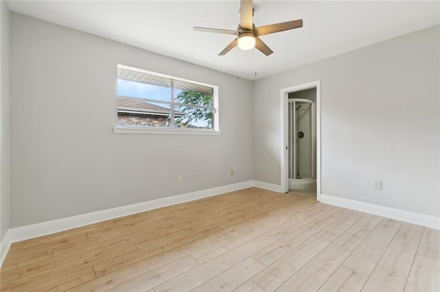 4901 Friar Tuck Dr, New Orleans, LA 70128 - unfurnished room with baseboards, light wood-type flooring, and ceiling fan
