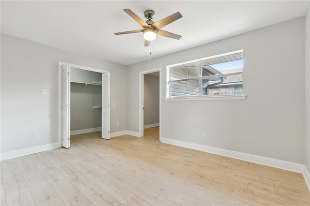 4901 Friar Tuck Dr, New Orleans, LA 70128 - unfurnished bedroom featuring light wood finished floors, baseboards, and a closet
