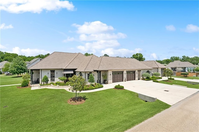 500 Tallow Tree Dr, Madisonville, LA 70447 - view of front of home featuring an attached garage, concrete driveway, and a front yard
