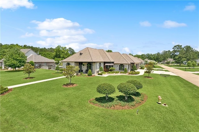 500 Tallow Tree Dr, Madisonville, LA 70447 - view of front of house featuring a front yard