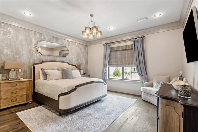 500 Tallow Tree Dr, Madisonville, LA 70447 - bedroom with a chandelier, wood finished floors, crown molding, and recessed lighting