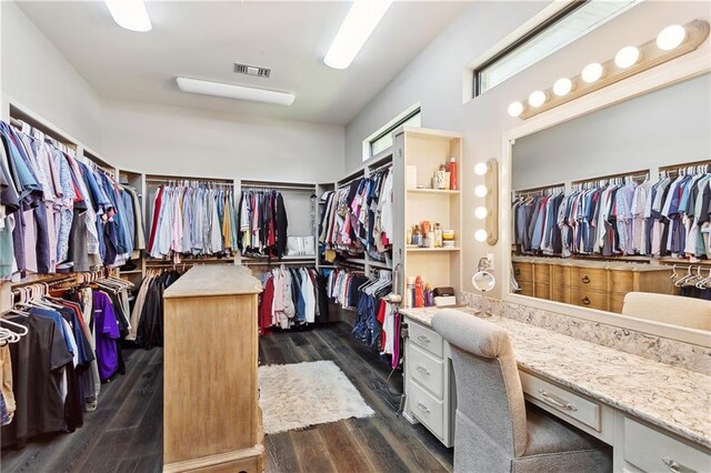 500 Tallow Tree Dr, Madisonville, LA 70447 - walk in closet featuring dark wood finished floors and built in study area