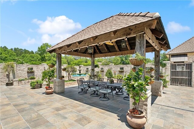 500 Tallow Tree Dr, Madisonville, LA 70447 - view of patio featuring a gazebo and outdoor dining space
