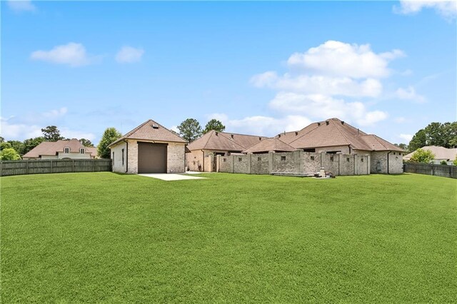 500 Tallow Tree Dr, Madisonville, LA 70447 - view of yard with a detached garage, a patio area, and driveway