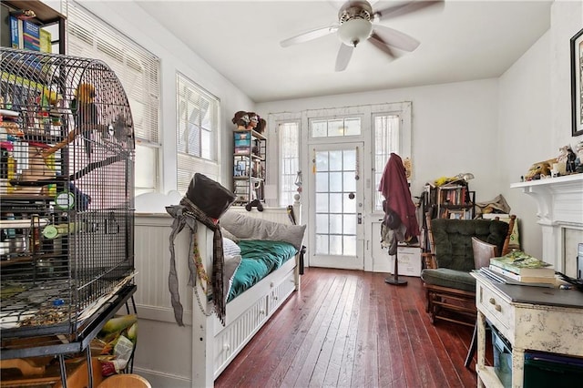 441214 Eden St, New Orleans, LA 70125 - foyer featuring hardwood / wood-style flooring, a ceiling fan, and a fireplace