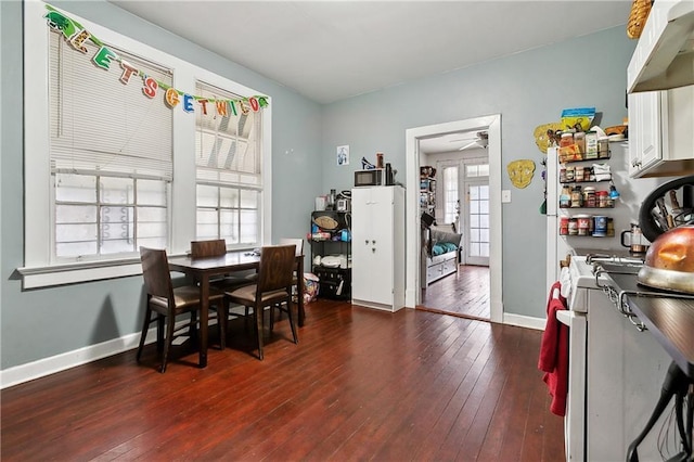 441214 Eden St, New Orleans, LA 70125 - dining space with dark wood finished floors, baseboards, and ceiling fan