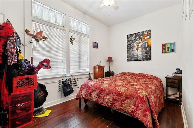 441214 Eden St, New Orleans, LA 70125 - bedroom featuring hardwood / wood-style floors, multiple windows, baseboards, and ceiling fan
