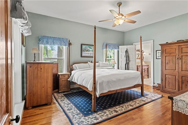 237 Villere Dr, Destrehan, LA 70047 - bedroom with multiple windows, light wood-type flooring, and ceiling fan