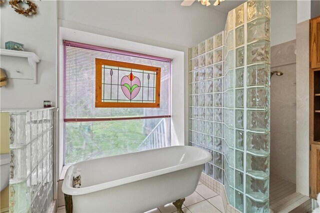 237 Villere Dr, Destrehan, LA 70047 - full bath with a freestanding bath, walk in shower, and tile patterned flooring