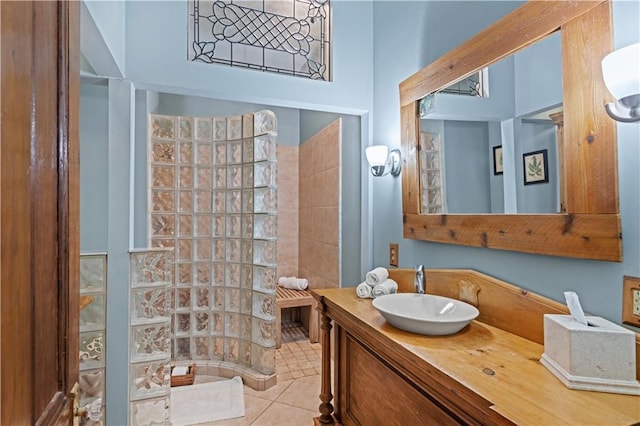 237 Villere Dr, Destrehan, LA 70047 - bathroom featuring walk in shower, vanity, and tile patterned flooring