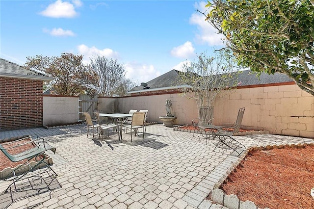 506 Doctor Gorman Dr, Belle Chasse, LA 70037 - fenced backyard with outdoor dining space and a patio