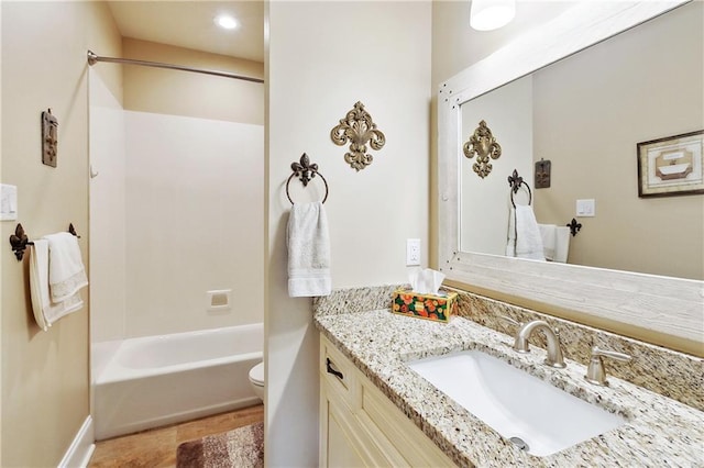 5001 Randolph St, Marrero, LA 70072 - full bathroom with vanity, toilet, shower / washtub combination, baseboards, and recessed lighting