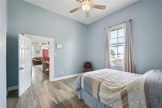 5530 Dauphine St, New Orleans, LA 70117 - bedroom featuring wood finished floors, baseboards, and a ceiling fan