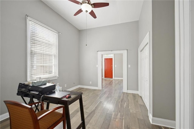 5530 Dauphine St, New Orleans, LA 70117 - office area featuring ceiling fan, wood finished floors, and baseboards