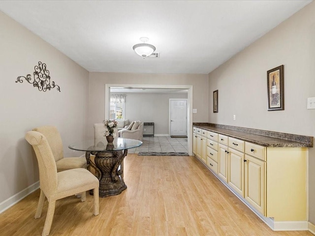 4536 Jasper St, Metairie, LA 70006 - dining room with light wood-style flooring and baseboards