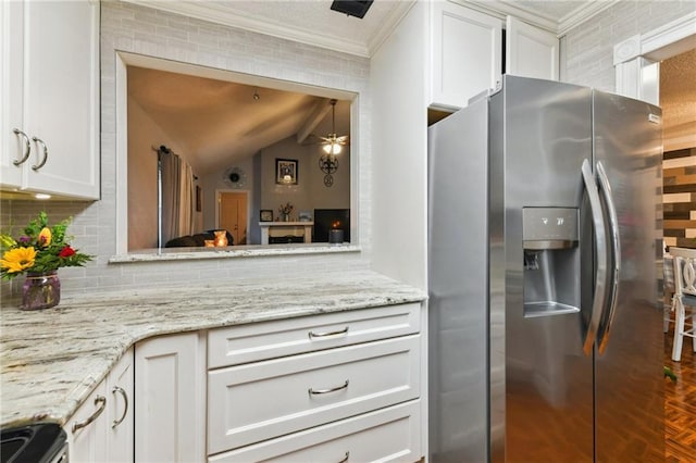 5304 Cross Creek Dr, Marrero, LA 70072 - kitchen featuring stainless steel refrigerator with ice dispenser, backsplash, crown molding, white cabinets, and light stone counters