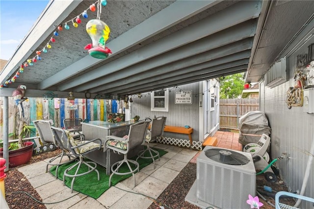 5304 Cross Creek Dr, Marrero, LA 70072 - view of patio with central AC and outdoor dining space