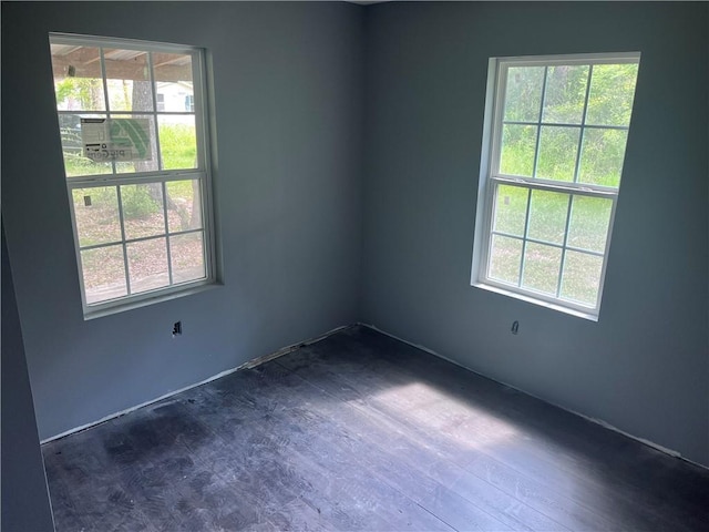 99 White St, Hammond, LA 70403 - unfurnished room with dark wood-style floors