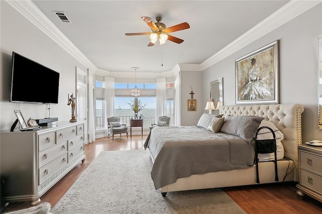 279 Debbie Dr, Slidell, LA 70458 - bedroom with dark wood-type flooring, crown molding, a ceiling fan, and access to outside