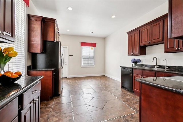 2609 General Pershing St, New Orleans, LA 70115 - kitchen featuring black dishwasher, baseboards, recessed lighting, hanging light fixtures, and a sink