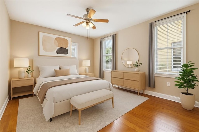 2609 General Pershing St, New Orleans, LA 70115 - bedroom featuring light wood-type flooring, baseboards, and ceiling fan
