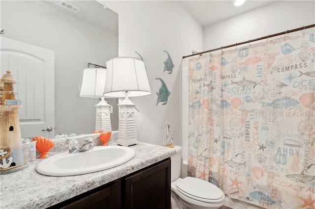 18181 Fox Hollow Loop, Hammond, LA 70401 - bathroom with vanity, toilet, and shower / tub combo with curtain