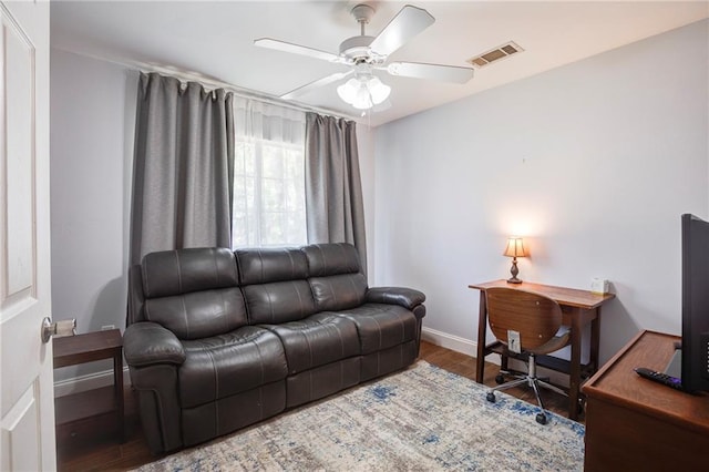 70046 9th St, Covington, LA 70433 - office area with baseboards, wood finished floors, and ceiling fan