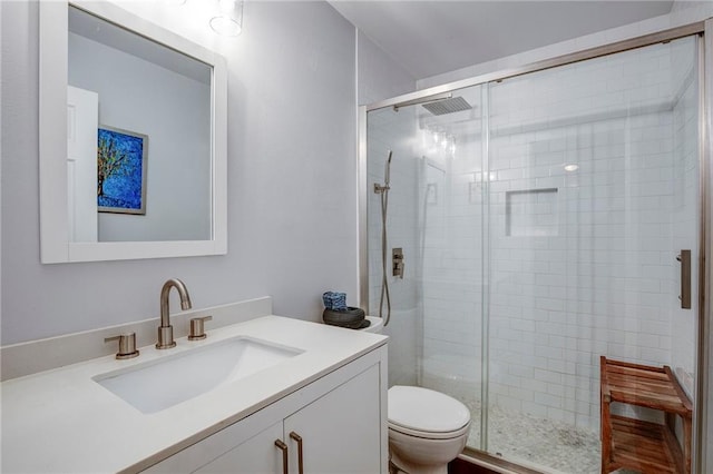 70046 9th St, Covington, LA 70433 - full bath featuring toilet, vanity, and a shower stall