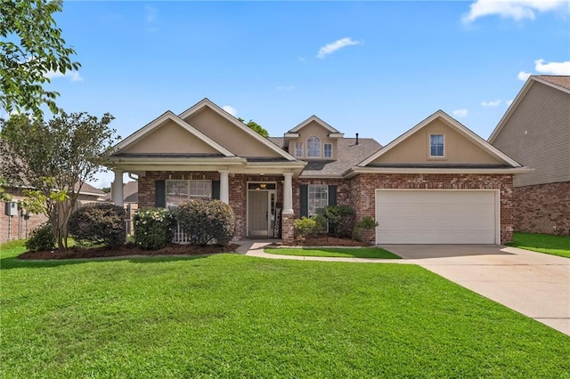 526 Moore Blvd, Covington, LA 70433 - craftsman-style house with a front yard, concrete driveway, a garage, and stucco siding