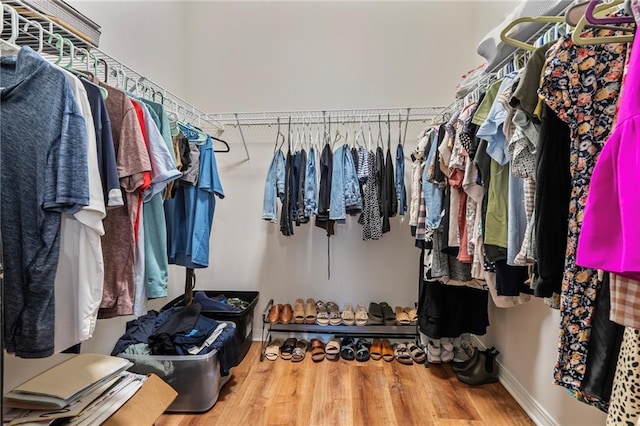 526 Moore Blvd, Covington, LA 70433 - walk in closet with wood finished floors