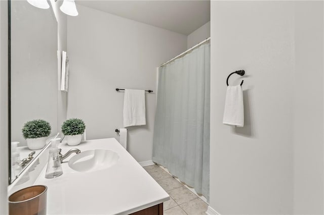 526 Moore Blvd, Covington, LA 70433 - full bathroom featuring vanity, tile patterned floors, a shower with shower curtain, and baseboards