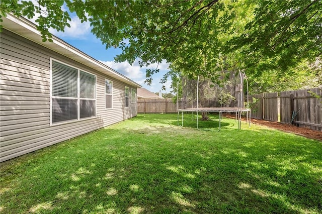 526 Moore Blvd, Covington, LA 70433 - view of yard featuring a trampoline