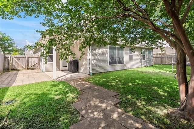 526 Moore Blvd, Covington, LA 70433 - rear view of property featuring a gate and a patio